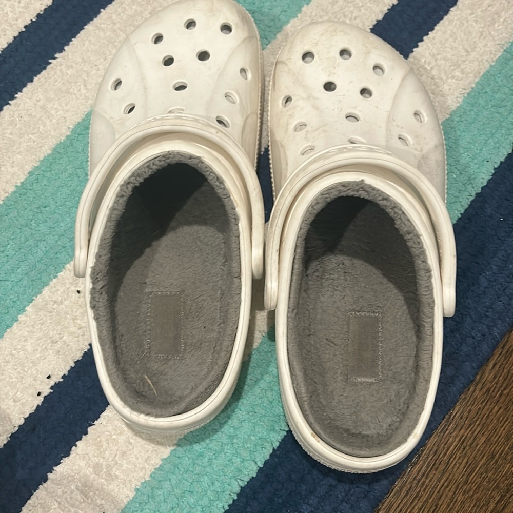 White and gray fuzzy Croc shoes